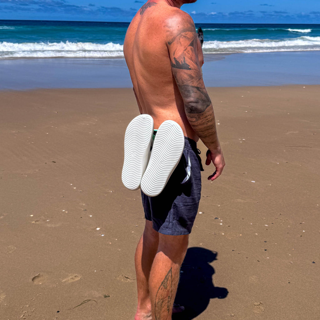 The Sandal Handle™ hands-free sandal carrier lifestyle photo