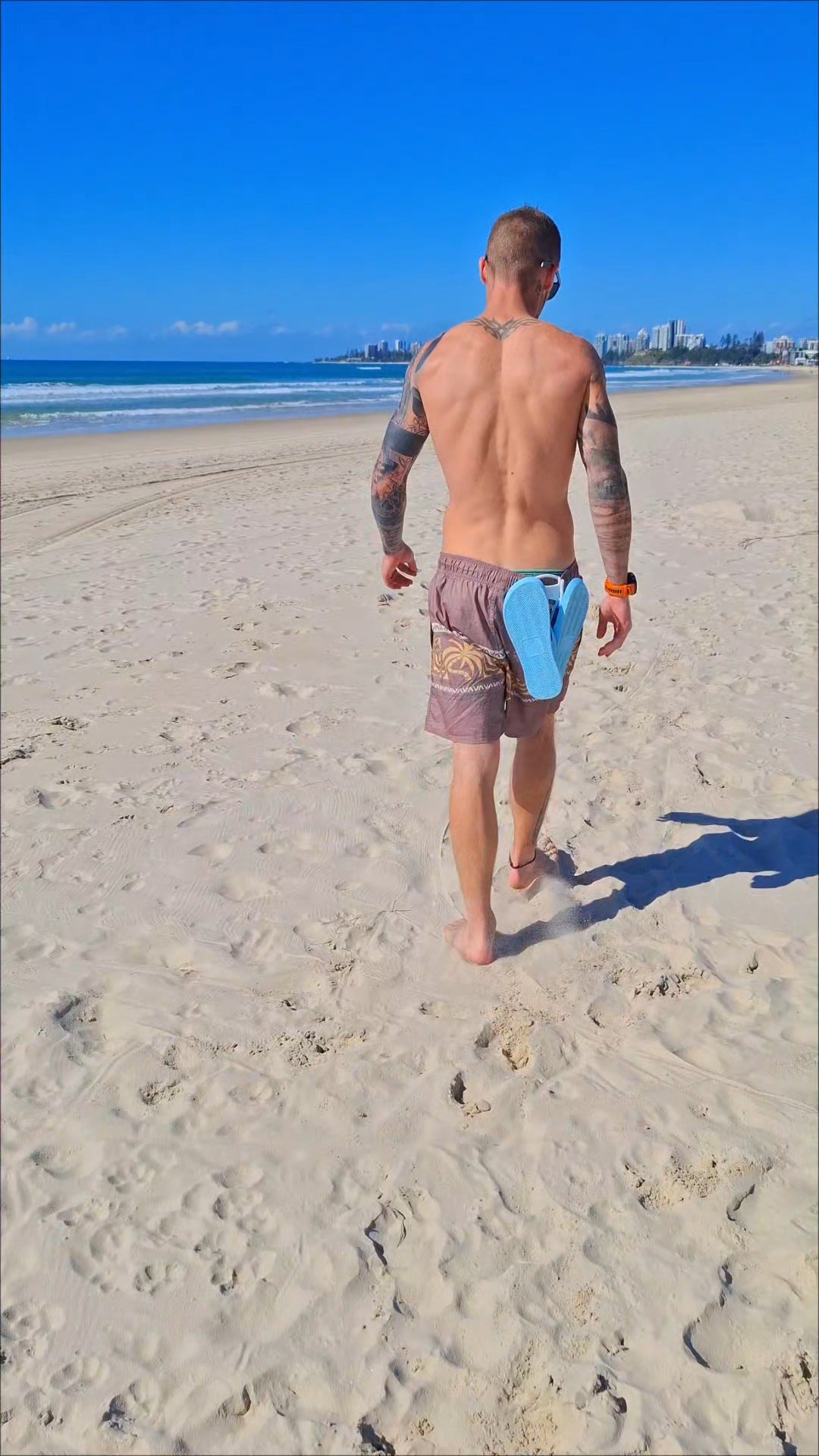 The Sandal Handle™ - Hands-Free Sandal Carrier