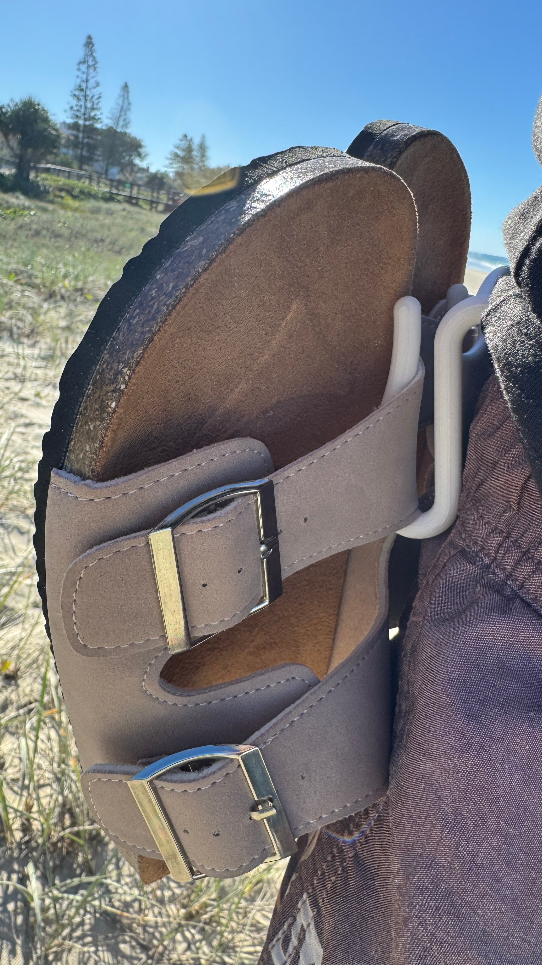 The Sandal Handle™ - Hands-Free Sandal Carrier